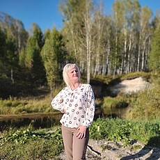 Эмилия, 52