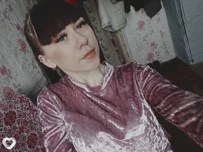 Оля