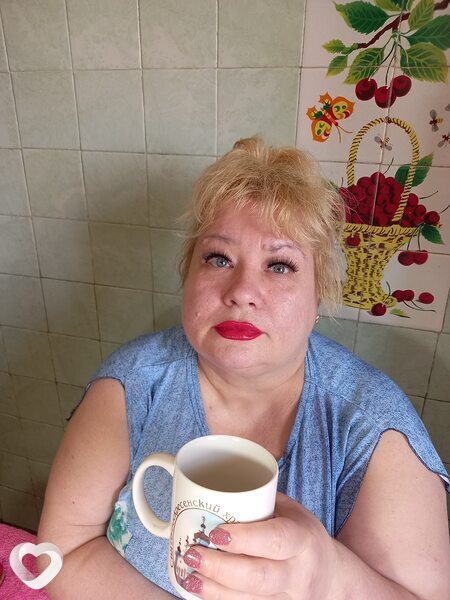 Мила