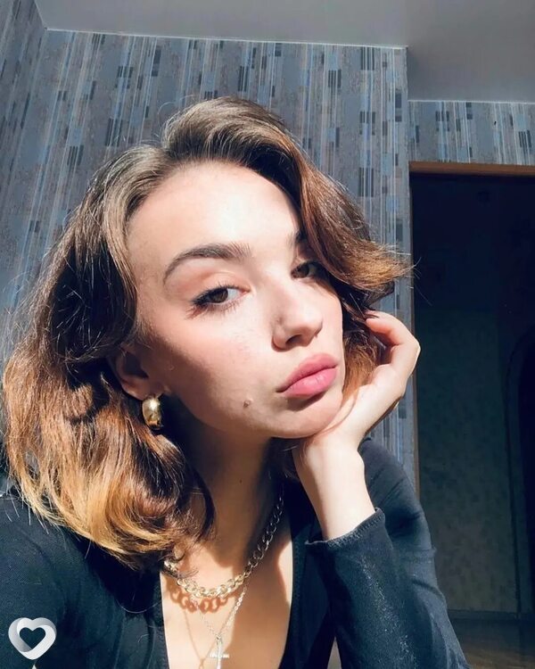 Мила