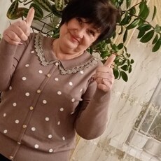 Эмилия, 60