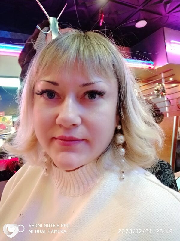 Мила