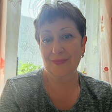 Эмилия, 60