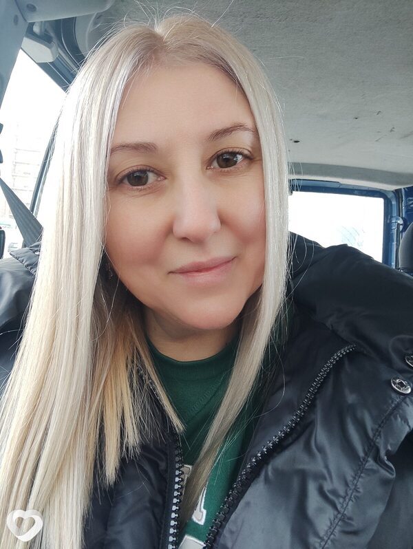 Мила