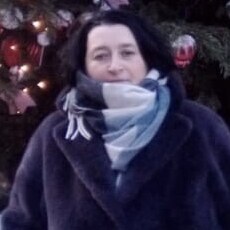 Эмилия, 56