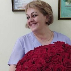 Эмилия, 56