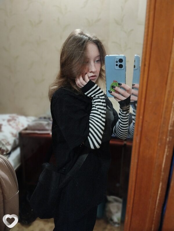 Мила