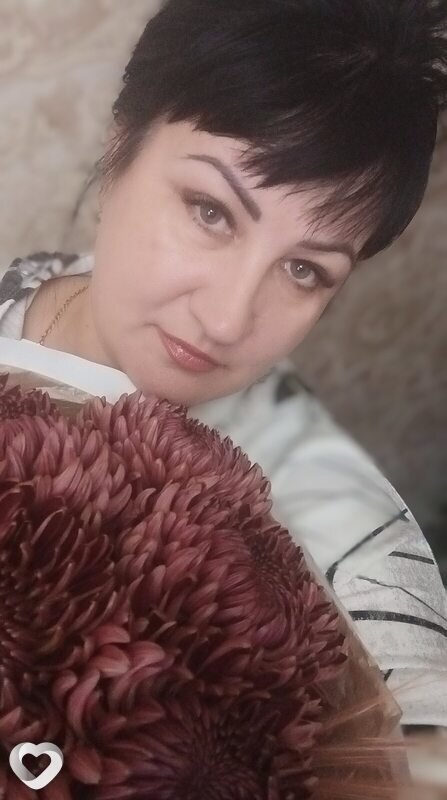 Мила