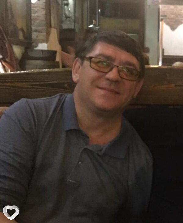 Николай