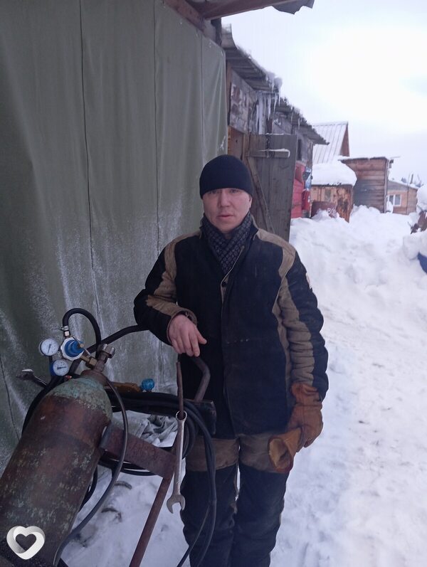 Николай